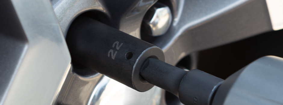 wheel being reinstalled as part of a vehicle's preventative maintenance service